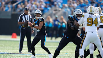 Nov 9, 2025; Charlotte, North Carolina, USA; Carolina Panthers quarterback Bryce Young (9) drops back to pass during the first quarter against the New Orleans Saints at Bank of America Stadium. Mandatory Credit: Jim Dedmon-Imagn Images