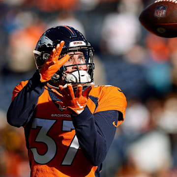 Nov 26, 2023; Denver, Colorado, USA; Denver Broncos cornerback Riley Moss (37) before the game against the Cleveland Browns at Empower Field at Mile High. Mandatory Credit: Isaiah J. Downing-Imagn Images