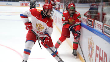 Ivan Ryabkin (11) Russia U18 and Timofey Mamanovich (79) of...
