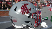 Sep 16, 2023; Pullman, Washington, USA; Washington State Cougars helmet sits during a game against the Northern Colorado Bears in the second half at Gesa Field at Martin Stadium. Mandatory Credit: James Snook-Imagn Images