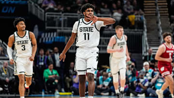 Michigan State guard Jase Richardson (11) celebrates a three point basket against Wisconsin during the first half of Big Ten Tournament semifinal at Gainbridge Fieldhouse in Indianapolis, Ind. on Saturday, March 15, 2025.