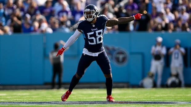 Tennessee Titans linebacker Harold Landry III (58) celebrates the fumble recovery