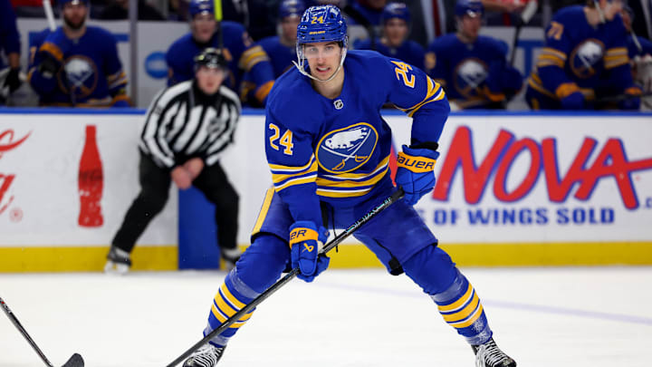 Feb 2, 2025; Buffalo, New York, USA;  Buffalo Sabres center Dylan Cozens (24) looks to make a pass during the second period against the New Jersey Devils at KeyBank Center. Mandatory Credit: Timothy T. Ludwig-Imagn Images