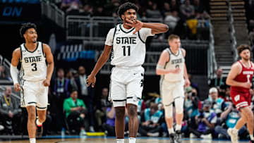 Michigan State guard Jase Richardson celebrates a 3-point basket against Wisconsin during the first half of a Big Ten Tournament semifinal at Gainbridge Fieldhouse in Indianapolis on Saturday, March 15, 2025.