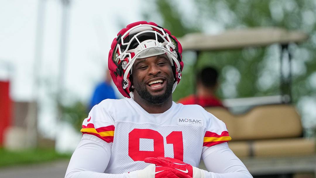 Jul 22, 2025; St. Joseph, MO, USA; Kansas City Chiefs defensive end Felix Anudike-Uzomah (91) walks down the hill to the practice fields during training camp at Missouri Western State University. Mandatory Credit: Denny Medley-Imagn Images