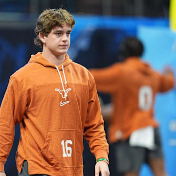 Jan 1, 2025; Atlanta, GA, USA; Texas Longhorns quarterback Arch Manning (16) warms up before the Peach Bowl at Mercedes-Benz Stadium. Mandatory Credit: Dale Zanine-Imagn Images