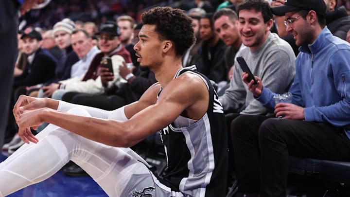Dec 25, 2024; New York, New York, USA; San Antonio Spurs center Victor Wembanyama (1) sits on the floor after getting fouled in the third quarter against the New York Knicks at Madison Square Garden. Mandatory Credit: Wendell Cruz-Imagn Images Dec 25, 2024; New York, New York, USA; San Antonio Spurs center Victor Wembanyama (1) sits on the floor after getting fouled in the third quarter against the New York Knicks at Madison Square Garden. Mandatory Credit: Wendell Cruz-Imagn Images