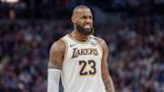 Apr 27, 2025; Minneapolis, Minnesota, USA; Los Angeles Lakers forward LeBron James (23) talks with a referee in the third quarter against the Minnesota Timberwolves during game four of first round for the 2025 NBA Playoffs at Target Center. Mandatory Credit: Matt Blewett-Imagn Images