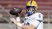 Nov 1, 2025; Stanford, California, USA; Pittsburgh Panthers quarterback Mason Heintschel (6) warms up before the game against the Stanford Cardinal at Stanford Stadium. Mandatory Credit: John Hefti-Imagn Images