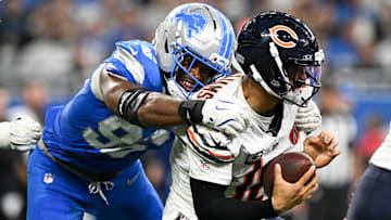  Detroit Lions linebacker Al-Quadin Muhammad (96) sacks Chicago Bears quarterback Caleb Williams (18) during the third quarter of the game at Ford Field.