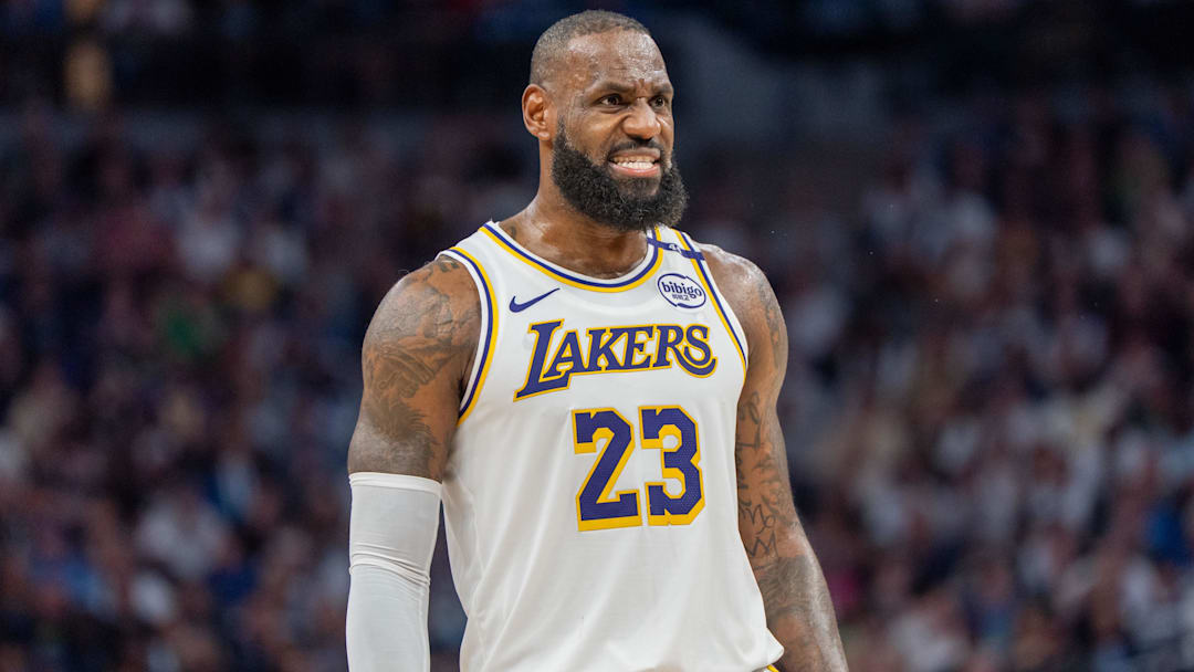 Apr 27, 2025; Minneapolis, Minnesota, USA; Los Angeles Lakers forward LeBron James (23) talks with a referee in the third quarter against the Minnesota Timberwolves during game four of first round for the 2025 NBA Playoffs at Target Center. Mandatory Credit: Matt Blewett-Imagn Images