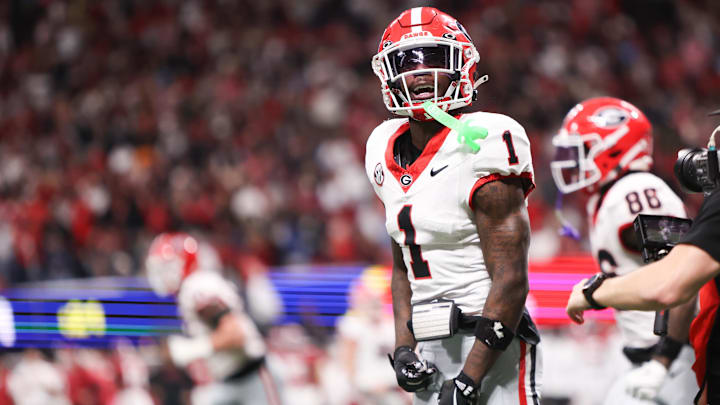 Dec 6, 2025; Atlanta, GA, USA; Georgia Bulldogs wide receiver Zachariah Branch (1) celebrates after scoring a touchdown during the fourth quarter against the Alabama Crimson Tide during the 2025 SEC Championship game at Mercedes-Benz Stadium. Mandatory Credit: Brett Davis-Imagn Images