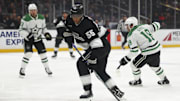 Dec 4, 2024; Los Angeles, California, USA; Los Angeles Kings right wing Quinton Byfield (55) reaches for the puck against the Dallas Stars during the second period of a hockey game at Crypto.com Arena. Mandatory Credit: Jessica Alcheh-Imagn Images