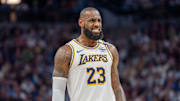 Apr 27, 2025; Minneapolis, Minnesota, USA; Los Angeles Lakers forward LeBron James (23) talks with a referee in the third quarter against the Minnesota Timberwolves during game four of first round for the 2025 NBA Playoffs at Target Center. Mandatory Credit: Matt Blewett-Imagn Images