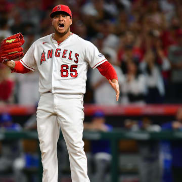 Apr 21, 2023; Anaheim, California, USA; Los Angeles Angels relief pitcher Jose Quijada (65) reacts after strking out Kansas City Royals first baseman Vinnie Pasquantino (9) during the ninth inning at Angel Stadium. Mandatory Credit: Gary A. Vasquez-USA TODAY Sports