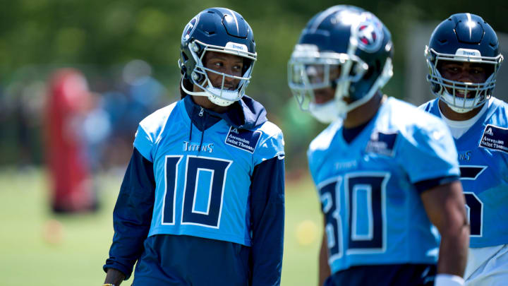 Wide receiver DeAndre Hopkins (10) and wide receiver Treylon Burks (16) communicate during Tennessee Titans practice at Ascension Saint Thomas Sports Park in Nashville, Tenn., Tuesday, May 21, 2024.
