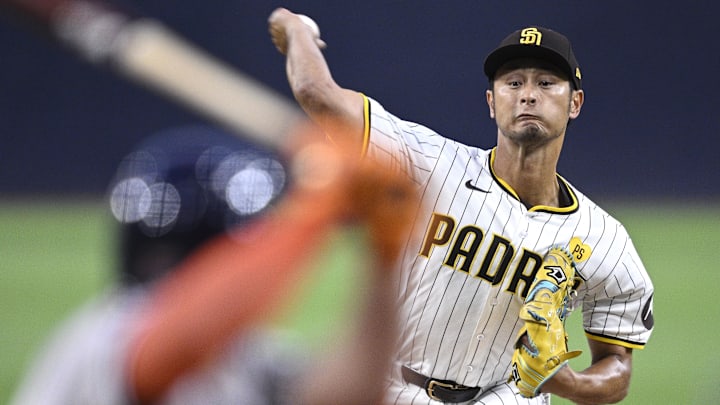 Sep 16, 2024; San Diego, California, USA; San Diego Padres starting pitcher Yu Darvish (11) pitches against the Houston Astros during the first inning at Petco Park.