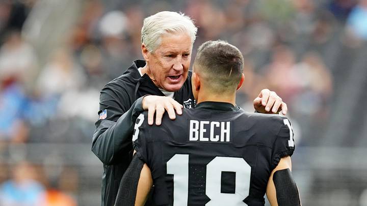 Oct 12, 2025; Paradise, Nevada, USA; Las Vegas Raiders wide receiver Jack Bech (18) and Las Vegas Raiders head coach Pete Carroll talk before the game against the Tennessee Titans at Allegiant Stadium. Mandatory Credit: Stephen R. Sylvanie-Imagn Images