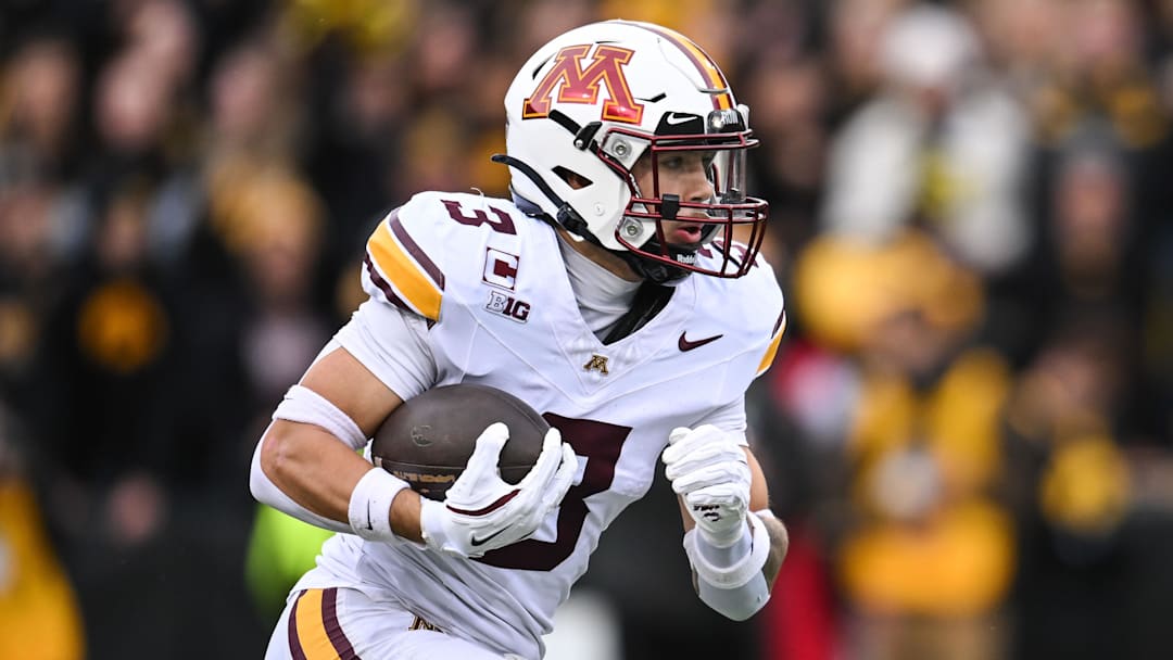 Oct 25, 2025; Iowa City, Iowa, USA; Minnesota Golden Gophers defensive back Koi Perich (3) returns a kickoff during the first quarter against the Iowa Hawkeyes at Kinnick Stadium. Oct 25, 2025; Iowa City, Iowa, USA; Minnesota Golden Gophers defensive back Koi Perich (3) returns a kickoff during the first quarter against the Iowa Hawkeyes at Kinnick Stadium.