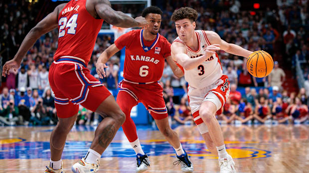 Anthony Dell'Orso drives to the basket for Arizona against Kansas in 202