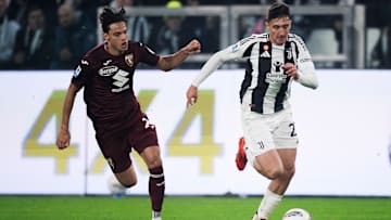 Andrea Cambiaso (R) of Juventus FC competes for the ball...
