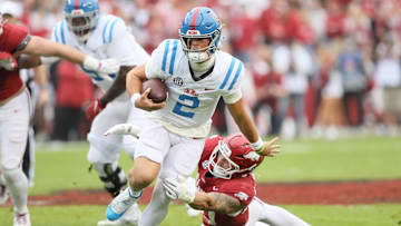 Nov 2, 2024; Fayetteville, Arkansas, USA; Ole Miss Rebels quarterback Jaxson Dart (2) rushes in the first quarter against the Arkansas Razorbacks at Donald W. Reynolds Razorback Stadium. Mandatory Credit: Nelson Chenault-Imagn Images