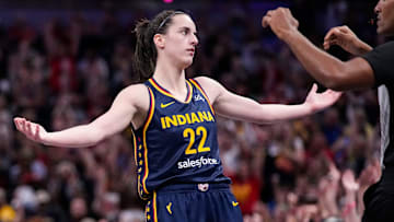 Indiana Fever guard Caitlin Clark (22) celebrates a three-point basket Sunday, Sept. 15, 2024, during the game at Gainbridge Fieldhouse in Indianapolis.
