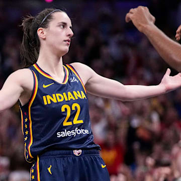 Indiana Fever guard Caitlin Clark (22) celebrates a three-point basket Sunday, Sept. 15, 2024, during the game at Gainbridge Fieldhouse in Indianapolis.