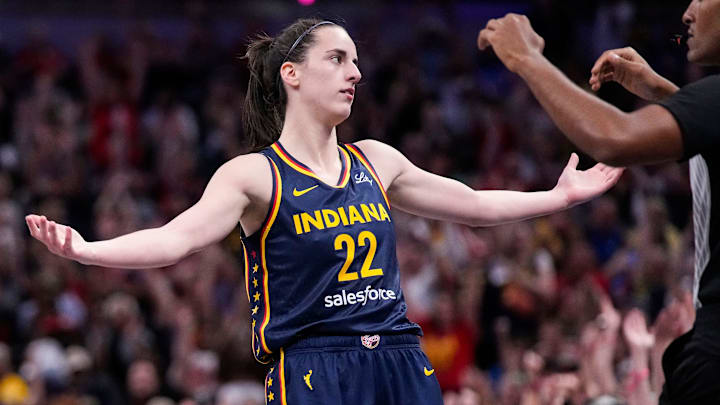 Indiana Fever guard Caitlin Clark (22) celebrates a three-point basket Sunday, Sept. 15, 2024, during the game at Gainbridge Fieldhouse in Indianapolis.