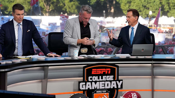 Oct. 4, 2025; Tuscaloosa, Alabama, USA; Rece Davis, Pat McAfee and Nick Saban interact on the set of ESPN’s College GameDay on location on the Quad at the University of Alabama before the Alabama versus Vanderbilt game.