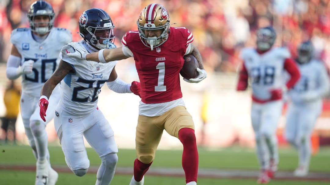 Dec 14, 2025; Santa Clara, California, USA; San Francisco 49ers wide receiver Ricky Pearsall (1) stiff arms Tennessee Titans cornerback Marcus Harris (26) during the third quarter at Levi's Stadium. Mandatory Credit: Cary Edmondson-Imagn Images Dec 14, 2025; Santa Clara, California, USA; San Francisco 49ers wide receiver Ricky Pearsall (1) stiff arms Tennessee Titans cornerback Marcus Harris (26) during the third quarter at Levi's Stadium. Mandatory Credit: Cary Edmondson-Imagn Images