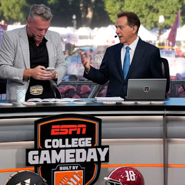 Oct. 4, 2025; Tuscaloosa, Alabama, USA; Rece Davis, Pat McAfee and Nick Saban interact on the set of ESPN’s College GameDay on location on the Quad at the University of Alabama before the Alabama versus Vanderbilt game.