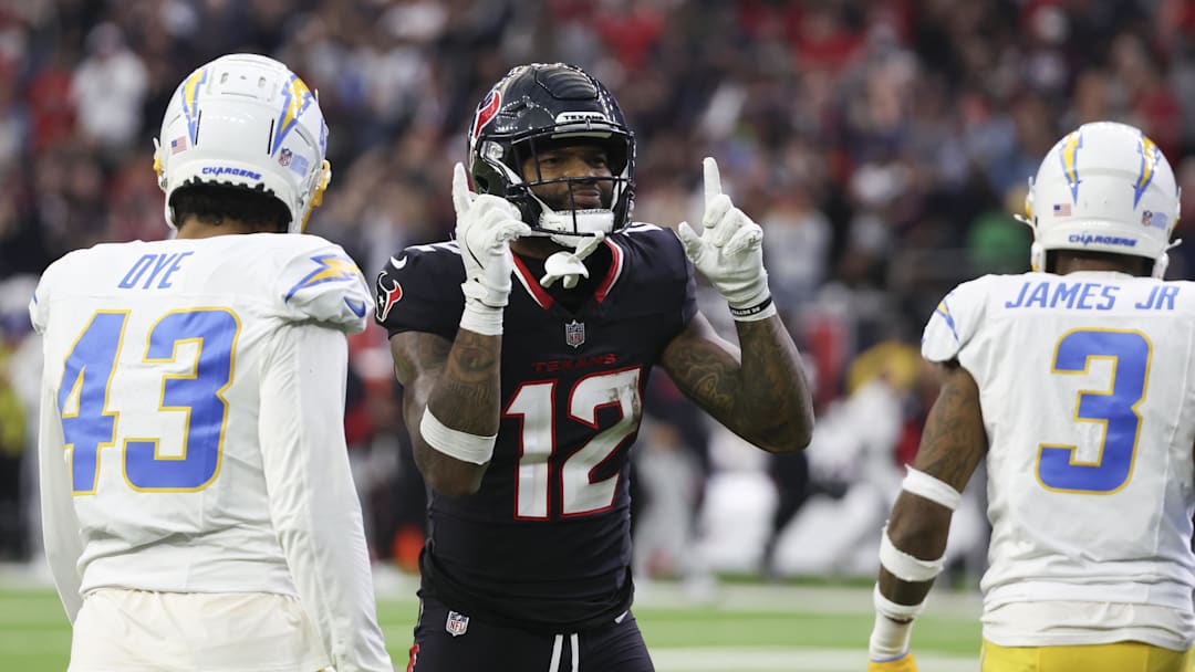 Jan 11, 2025; Houston, Texas, USA; Houston Texans wide receiver Nico Collins (12) reacts to a first down against the Los Angeles Chargers in the second quarter in an AFC wild card game at NRG Stadium. Mandatory Credit: Thomas Shea-Imagn Images Jan 11, 2025; Houston, Texas, USA; Houston Texans wide receiver Nico Collins (12) reacts to a first down against the Los Angeles Chargers in the second quarter in an AFC wild card game at NRG Stadium. Mandatory Credit: Thomas Shea-Imagn Images
