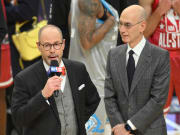 Feb 20, 2022; Cleveland, Ohio, USA; TBS announcer Ernie Johnson with NBA commissioner Adam Silver after Team LeBron defeated Team Durant in the 2022 NBA All-Star Game at Rocket Mortgage FieldHouse. Mandatory Credit: David Richard-USA TODAY Sports