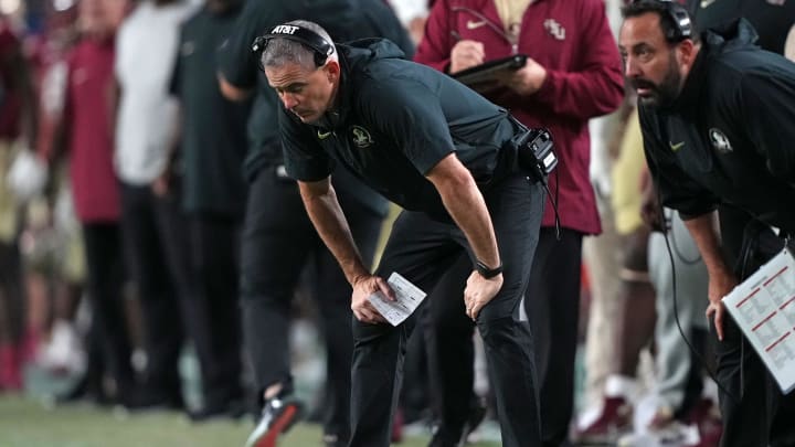 Dec 30, 2023; Miami Gardens, FL, USA; Florida State Seminoles head coach Mike Norvell reacts against the Georgia Bulldogs during the second half in the 2023 Orange Bowl at Hard Rock Stadium. Mandatory Credit: Jasen Vinlove-USA TODAY Sports