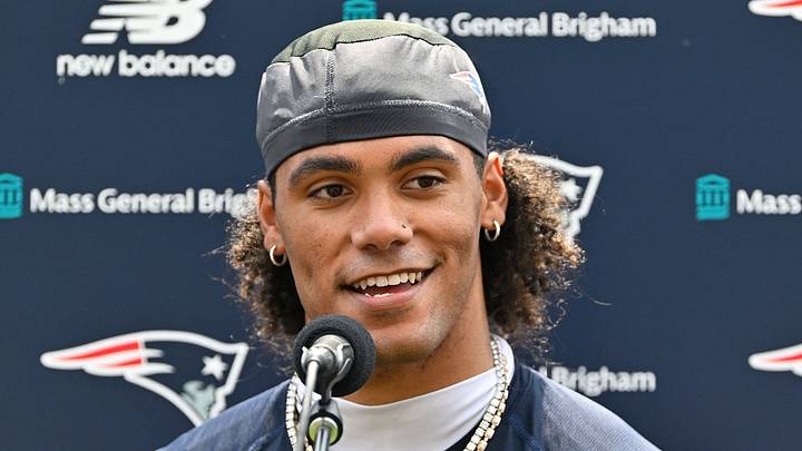 New England Patriots cornerback Christian Gonzalez (0).