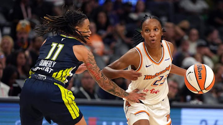 Jul 7, 2025; Phoenix, Arizona, USA; Phoenix Mercury guard Kiana Williams drives on Dallas Wings guard JJ Quinerly (11) in the second half at Footprint Center. Mandatory Credit: Rick Scuteri-Imagn Images Jul 7, 2025; Phoenix, Arizona, USA; Phoenix Mercury guard Kiana Williams drives on Dallas Wings guard JJ Quinerly (11) in the second half at Footprint Center. Mandatory Credit: Rick Scuteri-Imagn Images