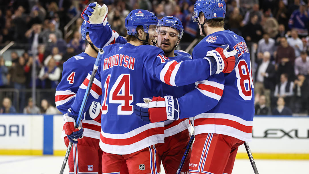 Oct 23, 2025; New York, New York, USA;  New York Rangers right wing Taylor Raddysh (14) celebrates with his teammates after scoring a goal in the first period against the San Jose Sharks at Madison Square Garden. Mandatory Credit: Wendell Cruz-Imagn Images Oct 23, 2025; New York, New York, USA;  New York Rangers right wing Taylor Raddysh (14) celebrates with his teammates after scoring a goal in the first period against the San Jose Sharks at Madison Square Garden. Mandatory Credit: Wendell Cruz-Imagn Images