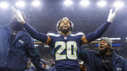 Dec 18, 2023; Seattle, Washington, USA; Seattle Seahawks safety Julian Love (20) celebrates on the bench after his second interception of the fourth quarter against the Philadelphia Eagles at Lumen Field.