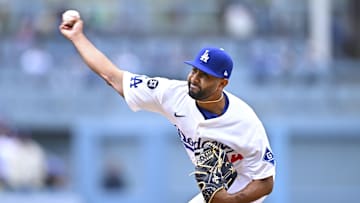 Apr 27, 2025; Los Angeles, California, USA; Los Angeles Dodgers pitcher Yoendrys Gomez (94) throws a pitch against the Pittsburgh Pirates during the ninth inning at Dodger Stadium. Mandatory Credit: Jonathan Hui-Imagn Images