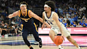 Creighton Bluejays guard Pop Isaacs (2) drives against UMKC Kangaroos guard Jamar Brown (5) in the second half at CHI Health Center Omaha.