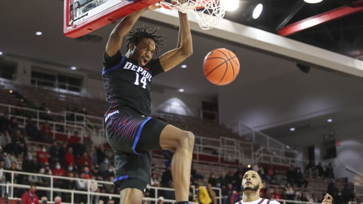 Jan 5, 2022; Queens, New York, USA;  DePaul Blue Demons forward Javan Johnson (1) dunks in the first