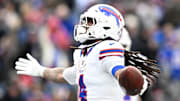 Buffalo Bills running back James Cook (4) reacts after scoring a touchdown against the New England Patriots during the second half at Gillette Stadium. 