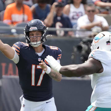 Tyson Bagent fires off a pass against the Dolphins in the first half of the preseason opener.