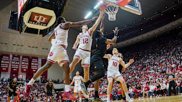 Indiana Hoosiers center Langdon Hatton (12) blocks a shot attempt from Winthrop Eagles guard Nick Johnson (10) during the second half at Simon Skjodt Assembly Hall.