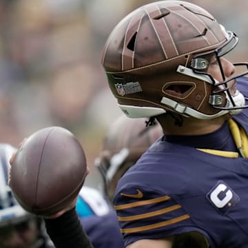 Green Bay Packers quarterback Jordan Love (10) throws downfield during the second quarter of their game against Carolina.
