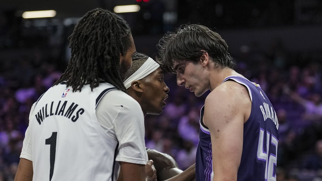 Mar 22, 2026; Sacramento, California, USA; Brooklyn Nets guard Terance Mann (14) and Sacramento Kings center Maxime Raynaud (42) get into an argument during the third quarter at Golden 1 Center. Mandatory Credit: Justine Willard-Imagn Images