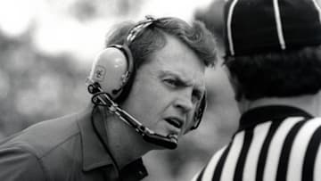 Sep 1986; Lincoln, NE, USA; FILE PHOTO; Nebraska Cornhuskers head coach Tom Osborne talks to a referee during the 1986 season at Memorial Stadium.