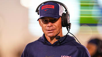 Oct 26, 2024; East Hartford, Connecticut, USA;  Connecticut Huskies head coach Jim Mora watches from the sideline as they take on the Rice Owls at Rentschler Field at Pratt & Whitney Stadium. Mandatory Credit: David Butler II-Imagn Images
