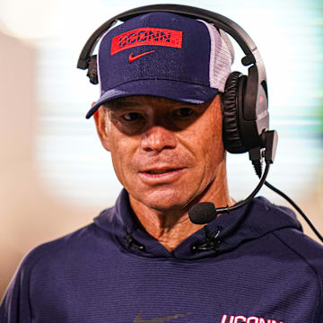 Oct 26, 2024; East Hartford, Connecticut, USA;  Connecticut Huskies head coach Jim Mora watches from the sideline as they take on the Rice Owls at Rentschler Field at Pratt & Whitney Stadium. Mandatory Credit: David Butler II-Imagn Images